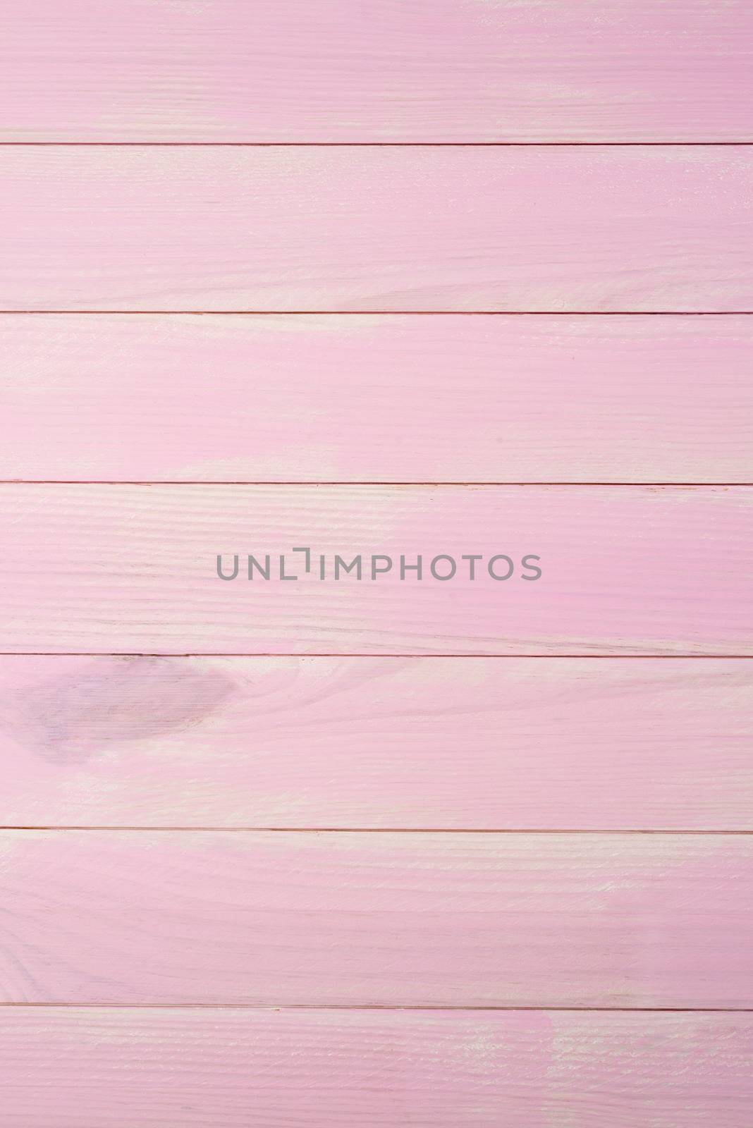 wood texture with pink color background.