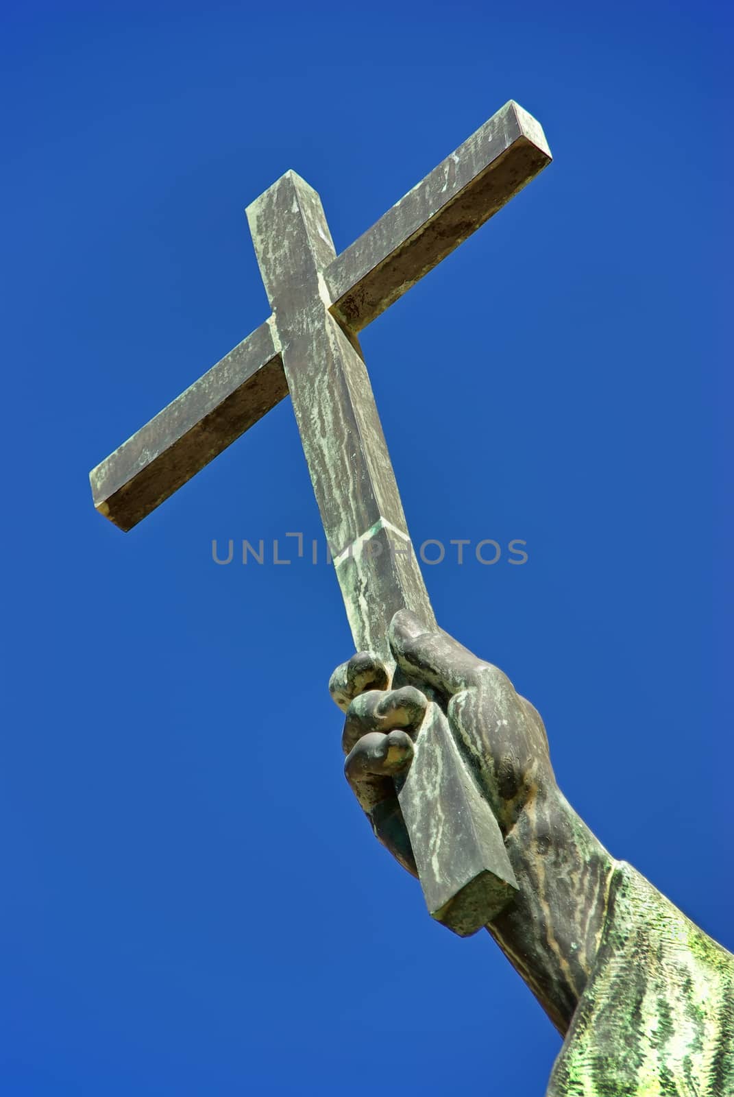 Christian cross over an sky background