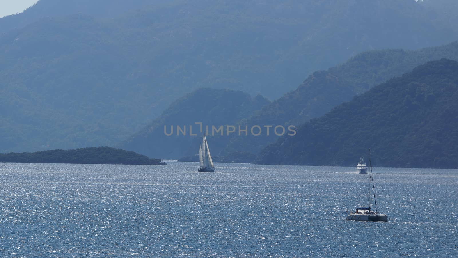 Beautiful white vessels navigates in Marmaris gulf, Turkey by eicvl5
