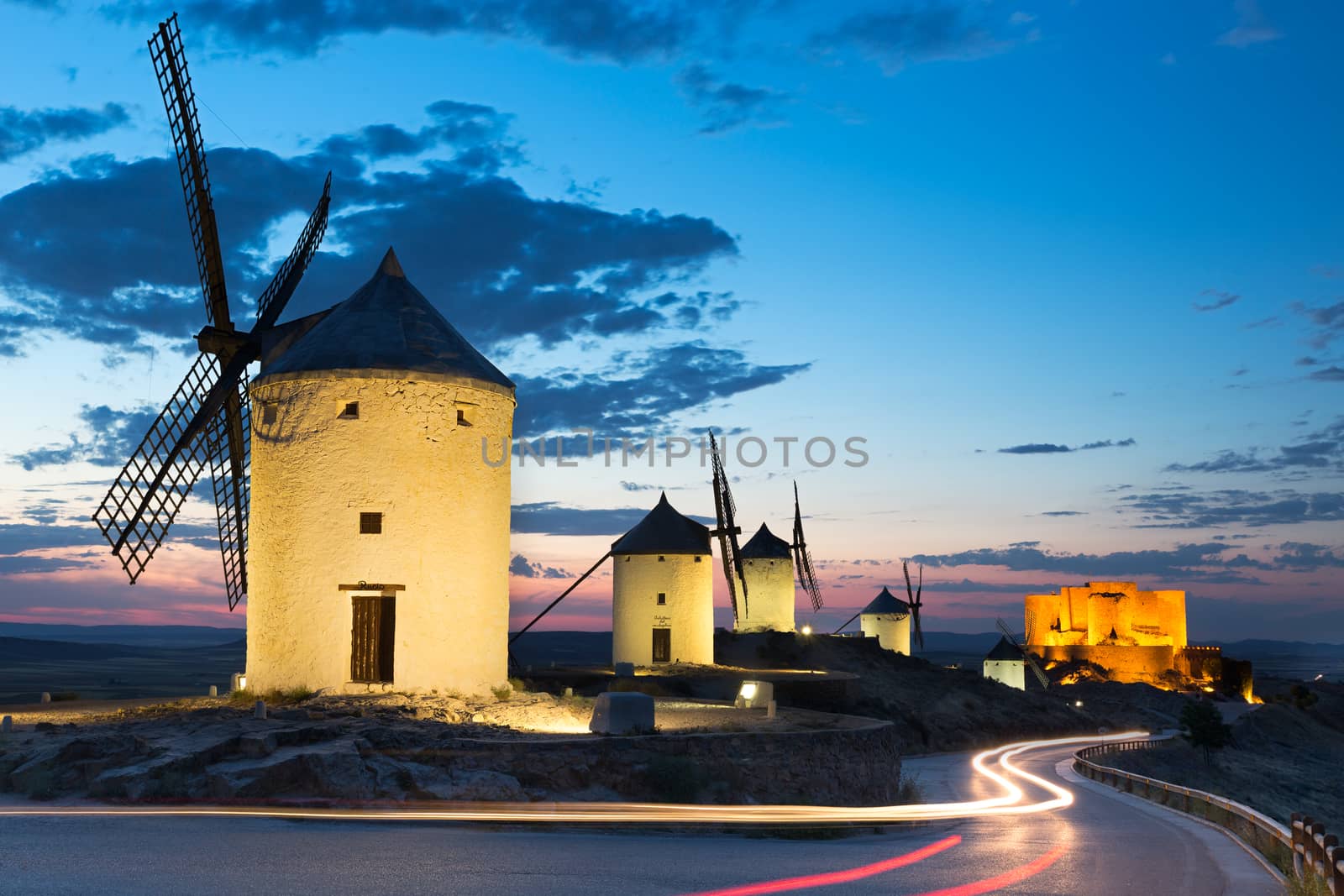 Windmills at dusk, Consuegra, Castile-La Mancha, Spain by fisfra