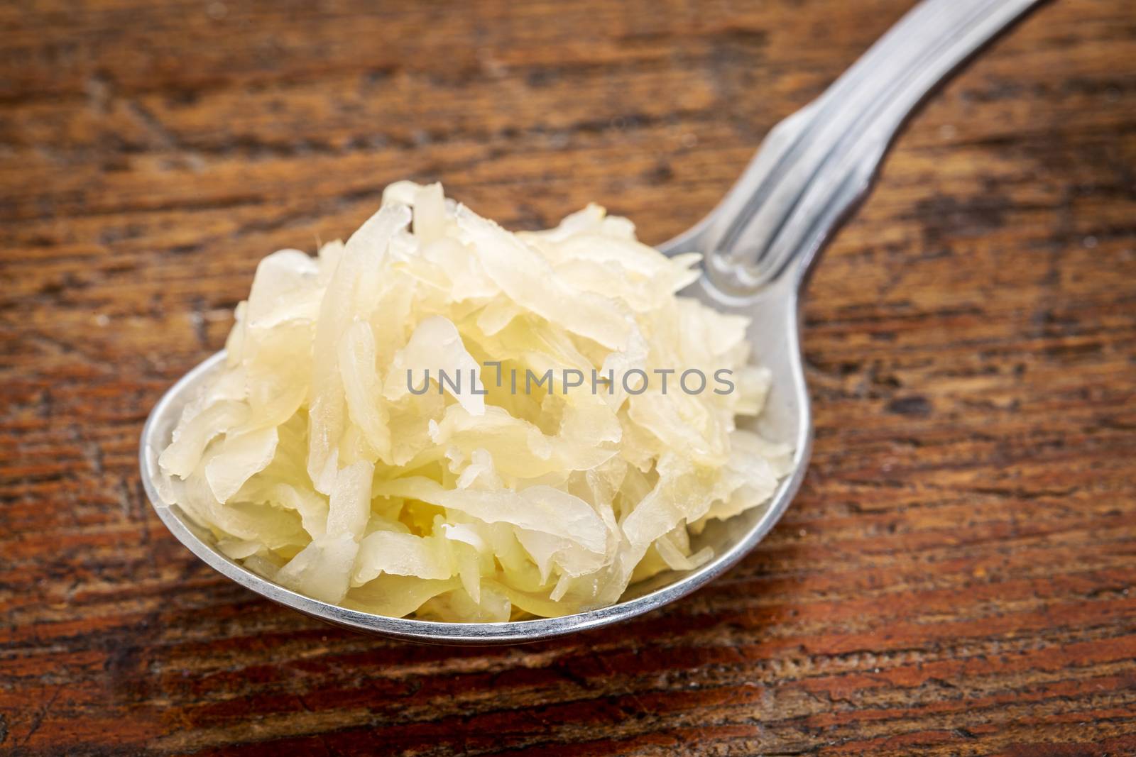 tablespoon of sauerkraut by PixelsAway