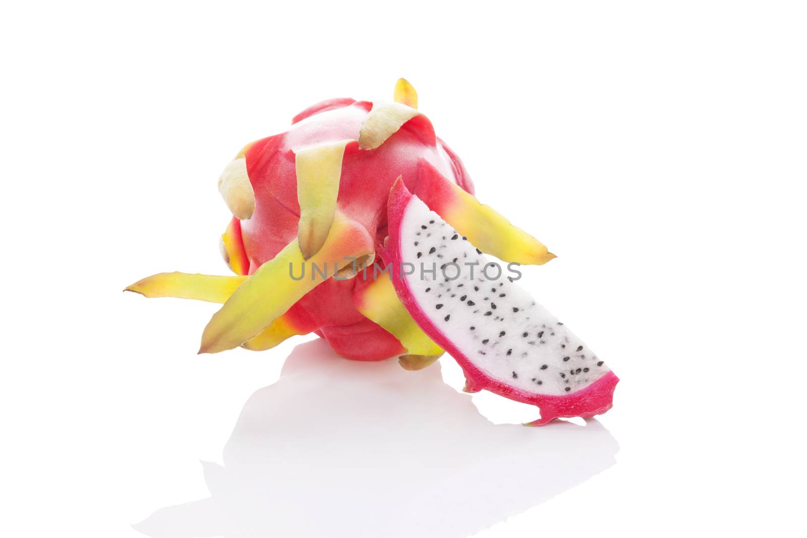 Delicious ripe dragon fruit isolated on white background. Tropical fruit, pitaya concept. Healthy eating. 