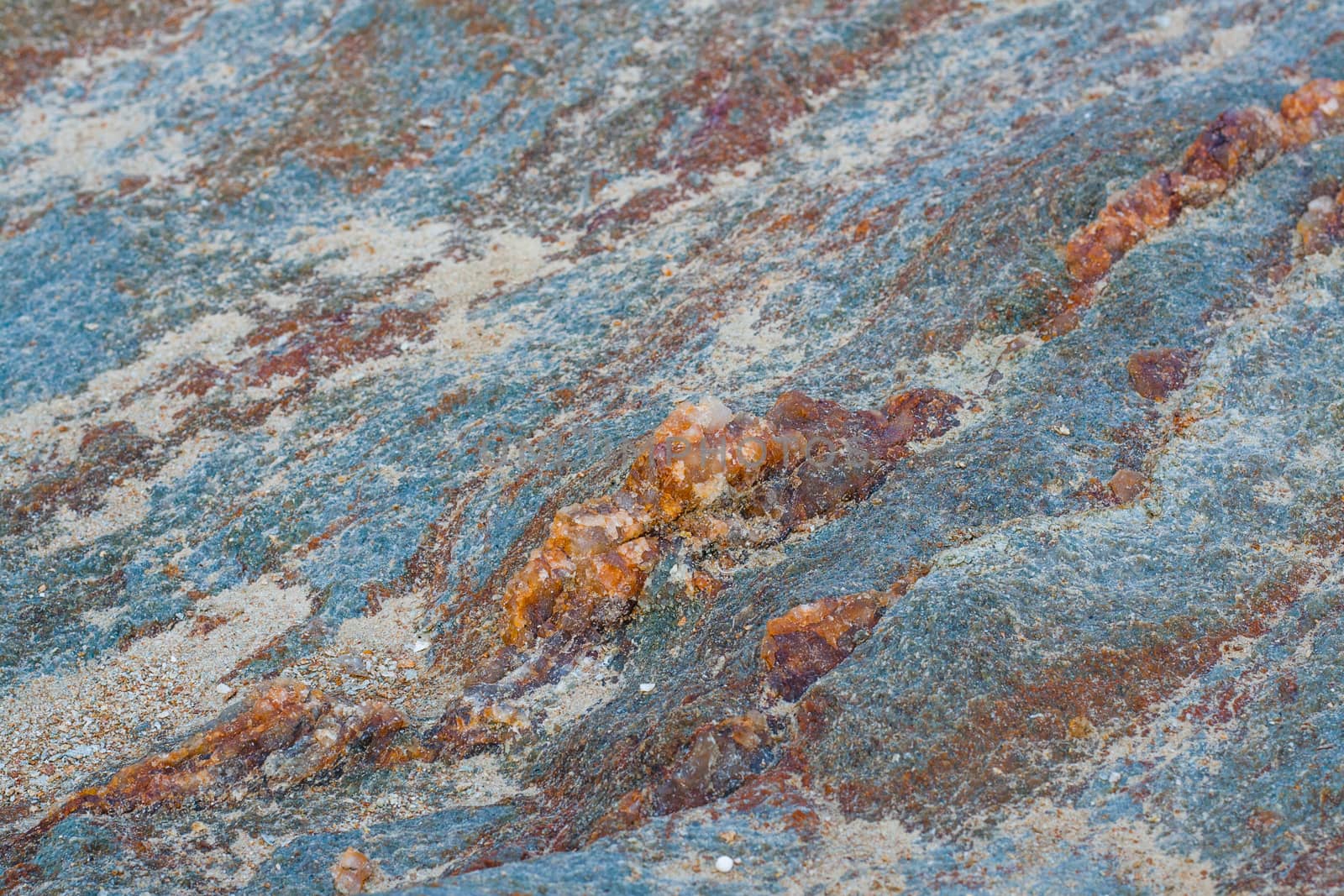 Texture background of rock granite stone by iampuay