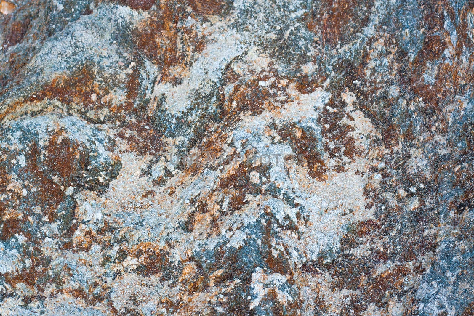 Texture background of rock granite stone in many color