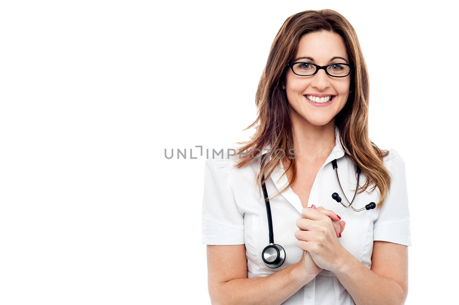Happy female doctor with her hands clasped