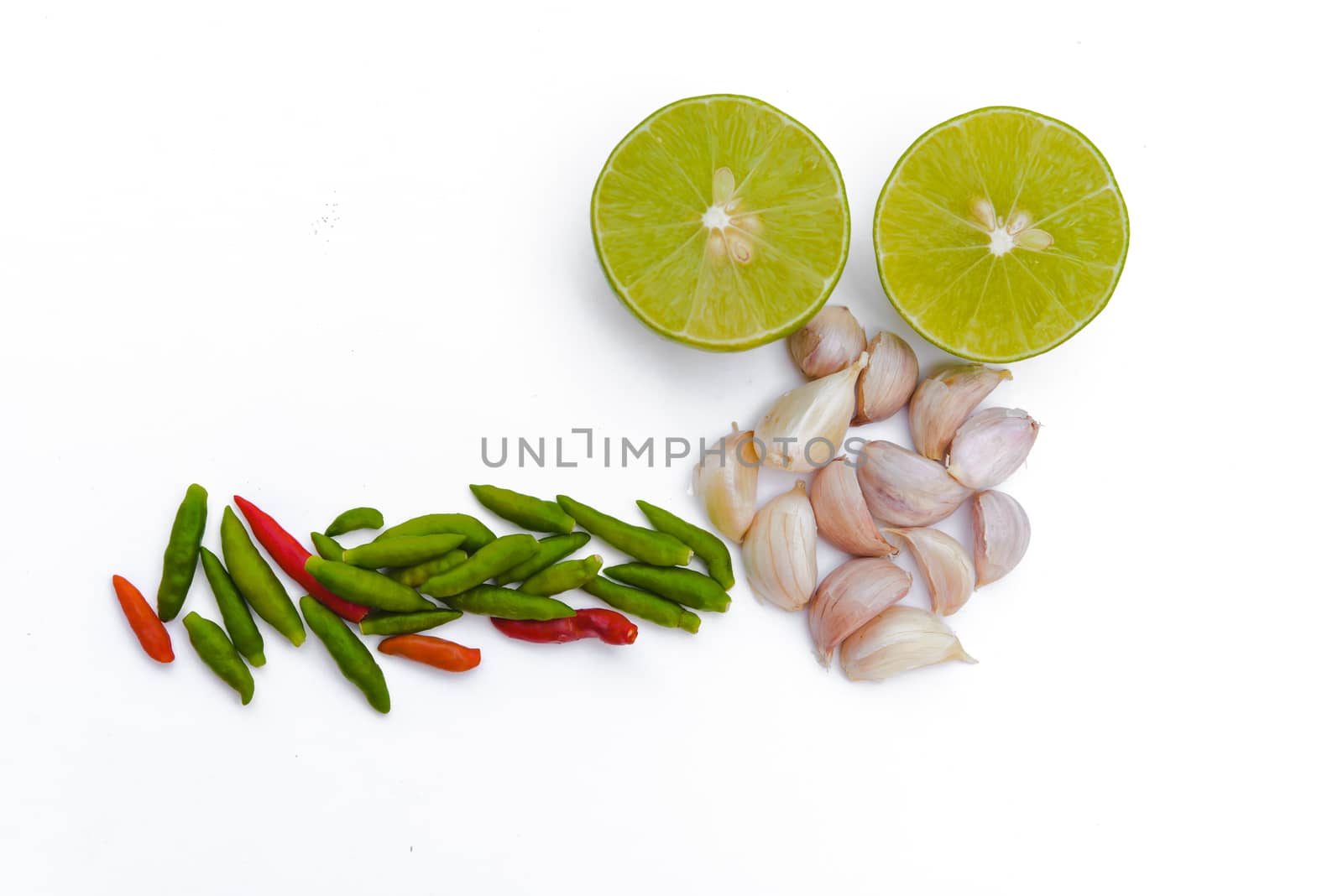 Chili peppers, garlic and lime on white background. Asian ingredients food