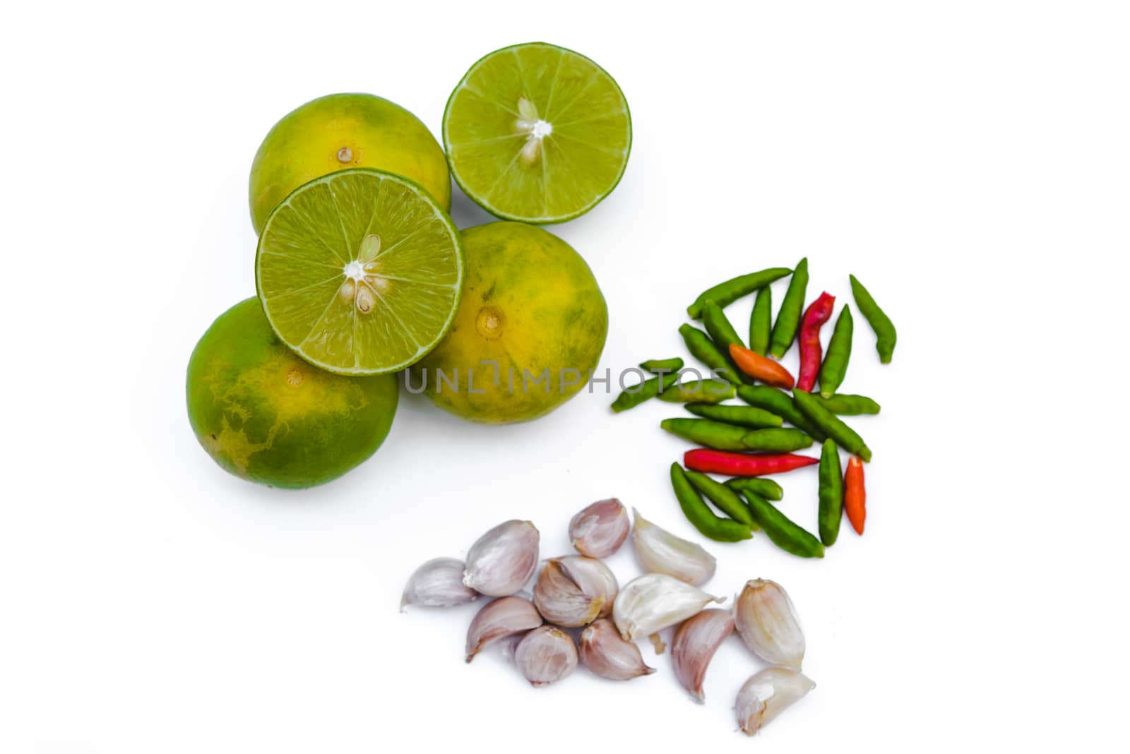 Chili peppers, garlic and lime on white background. Asian ingredients food