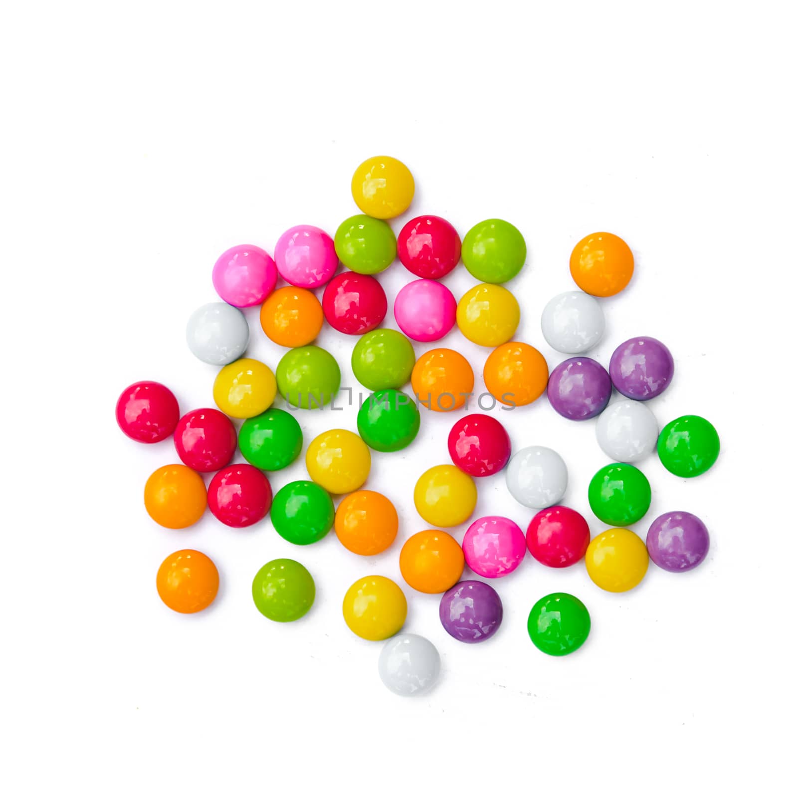 Colorful candies on white background