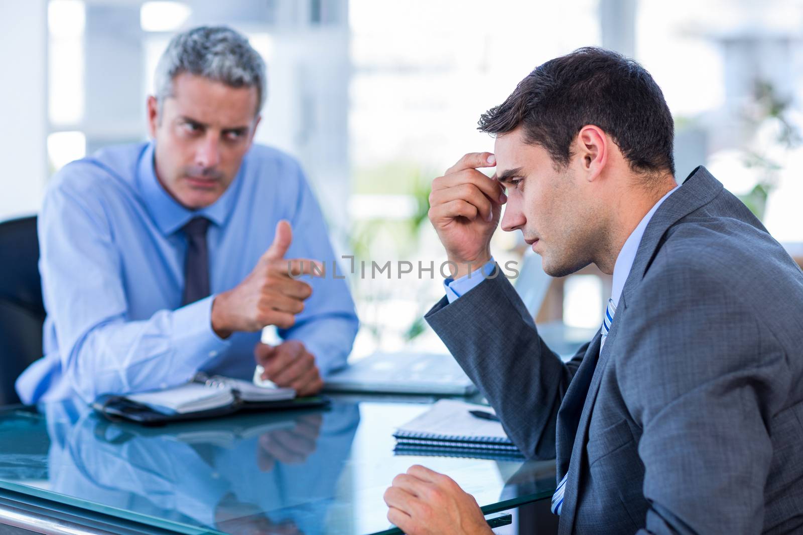 Business people having an argument  by Wavebreakmedia