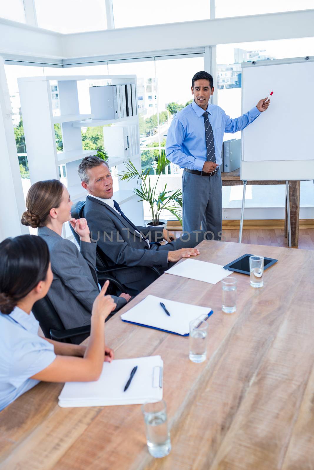 Business people talking during a meeting by Wavebreakmedia