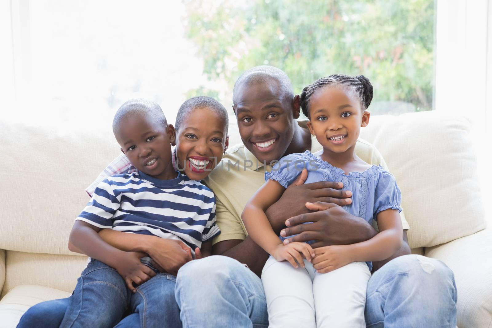 Happy family on the couch in the living room 