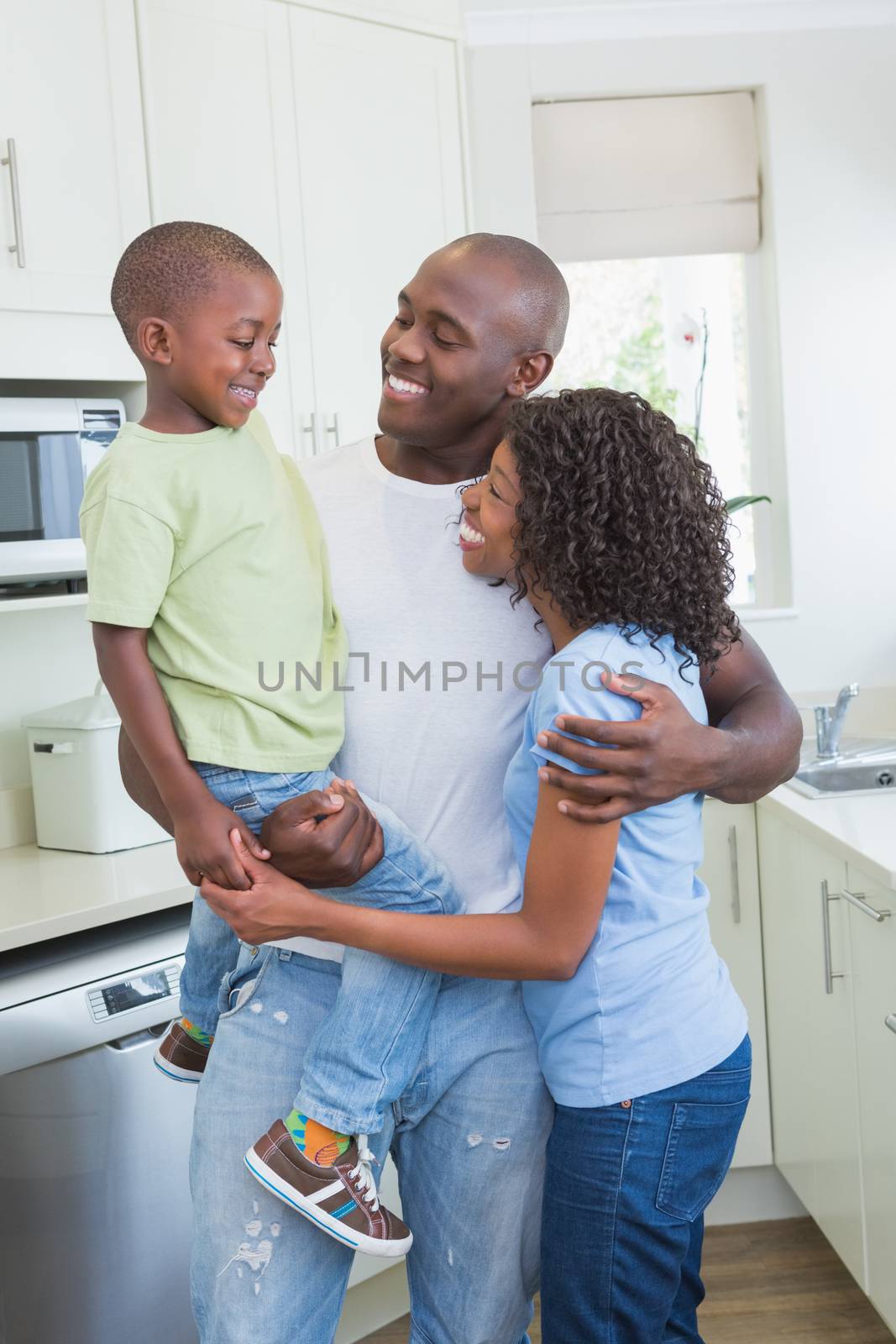 Happy smiling family in the kitchen 
