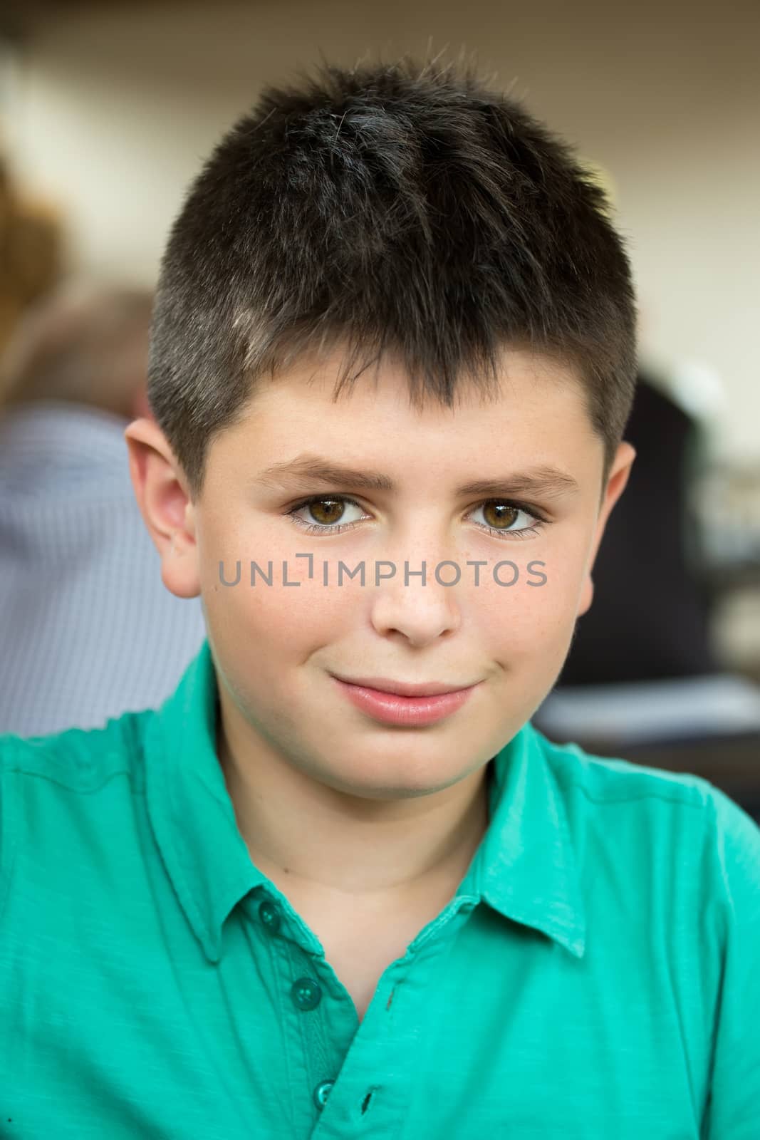 outdoor portrait of young teenager boy with shallow focus