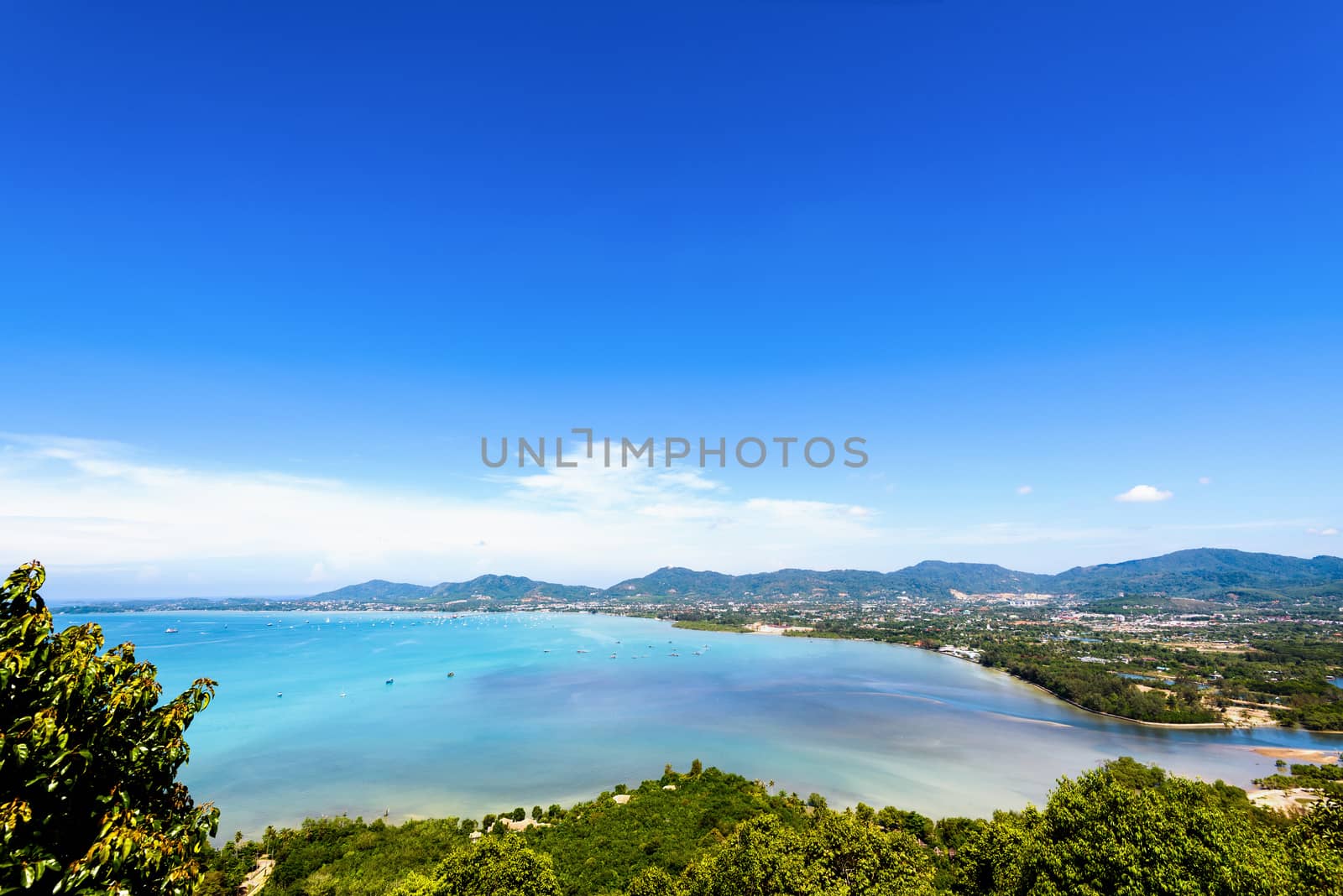 High angle view sea sky and seaside tourist town of Ao Chalong bay from Khao-Khad mountain viewpoint famous attractions in Phuket island, Thailand