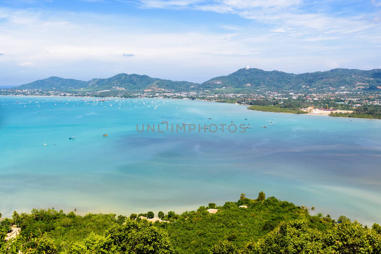 High angle view sea sky and seaside tourist town of Ao Chalong bay from Khao-Khad mountain viewpoint famous attractions in Phuket island, Thailand