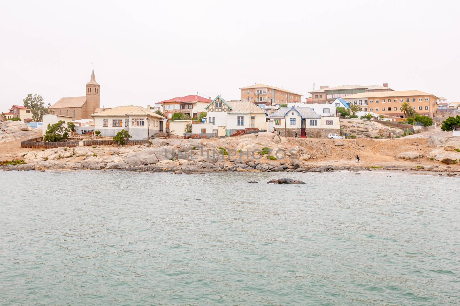 LUDERITZ, NAMIBIA - JUNE 14, 2011: A view of Luderitz on a gloomy day. The small town was founded by the German settlers in 1883 and has a distinct German atmosphere