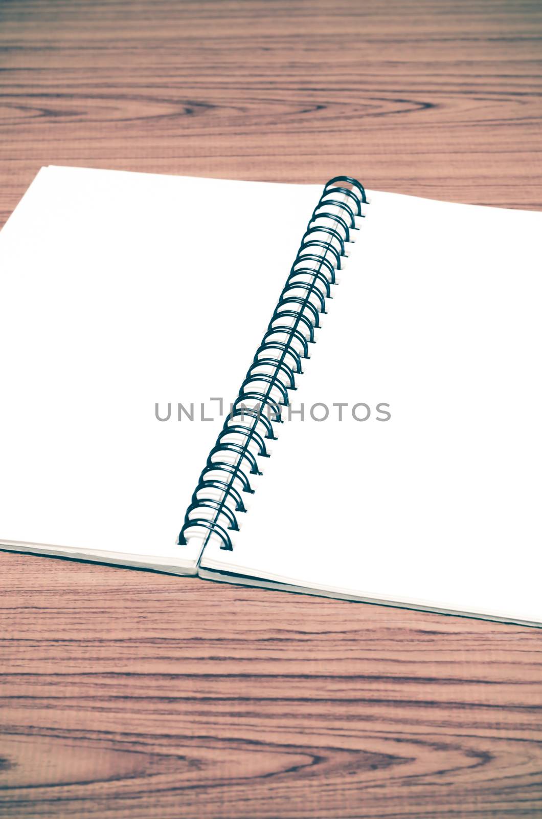 notebook line on wood background vintage style