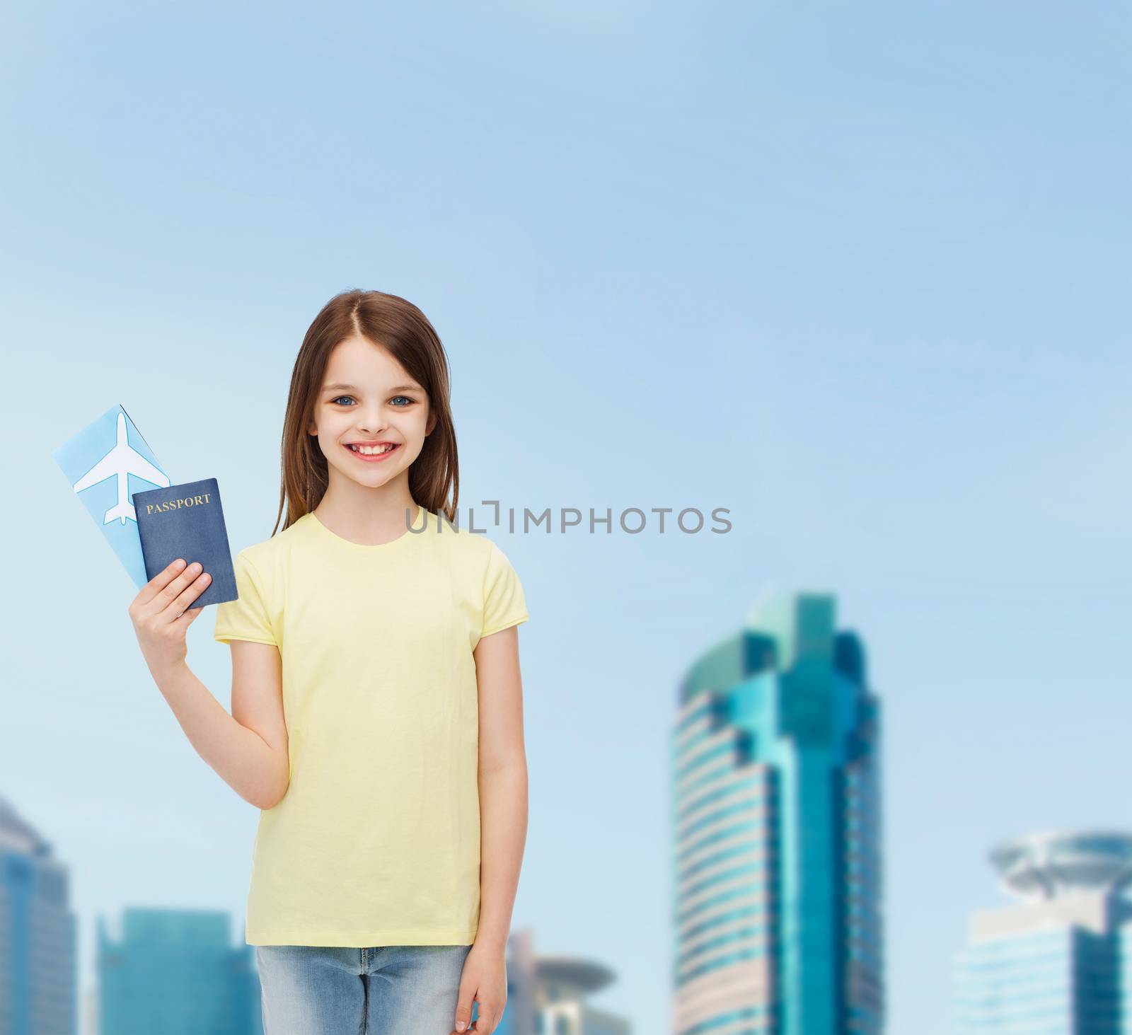 smiling little girl with ticket and passport by dolgachov