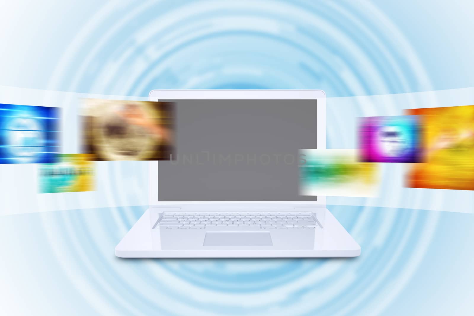 Laptop and wide virtual tape with colorful pictures on abstract background