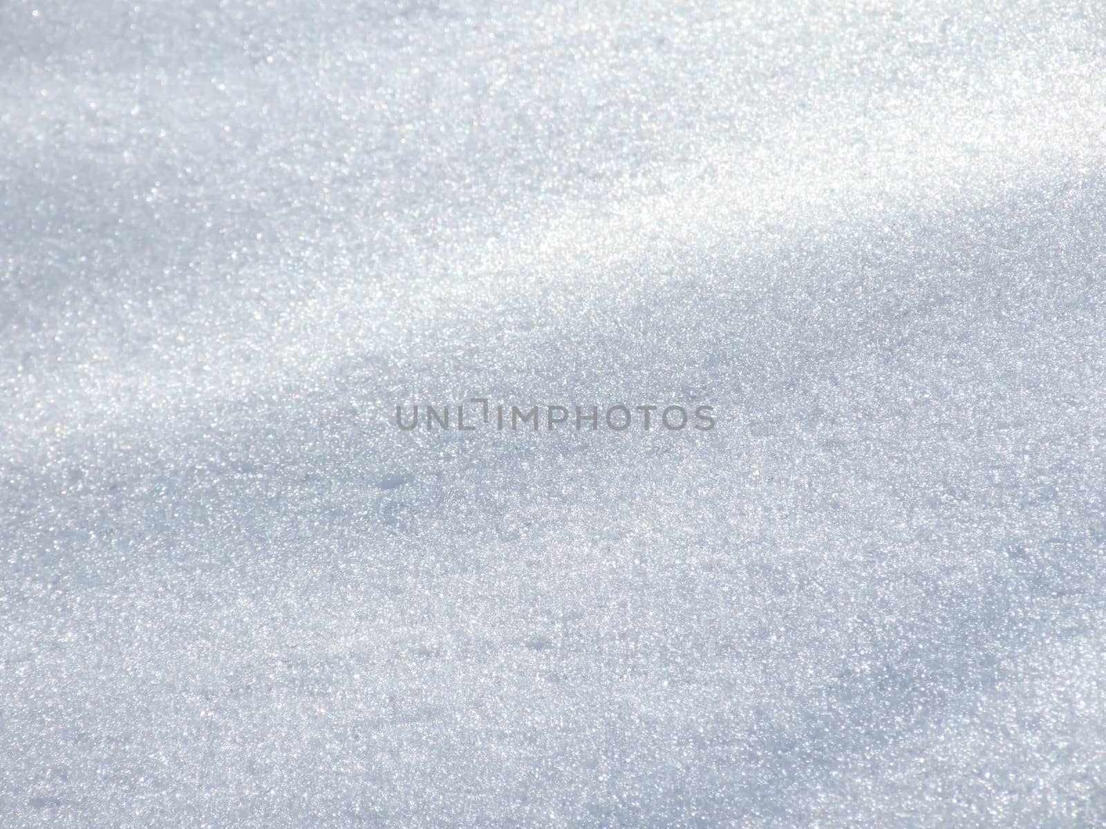 Snow surface background by fadeinphotography