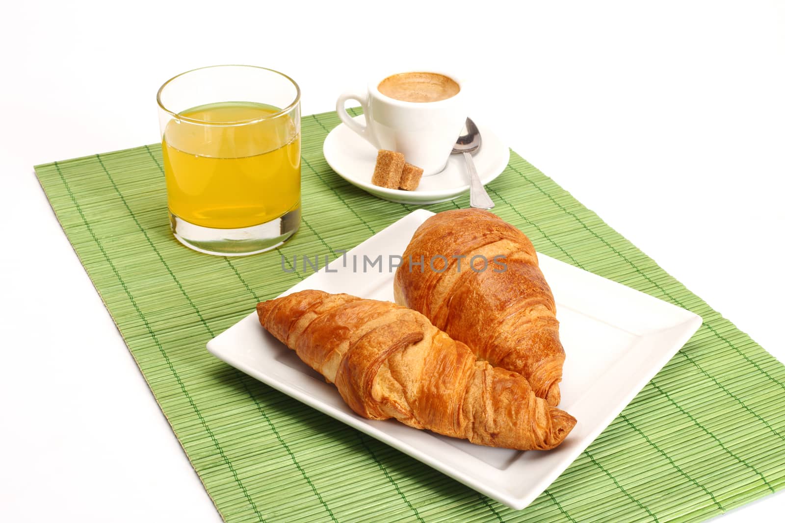 Coffee and croissants close up shallow dof