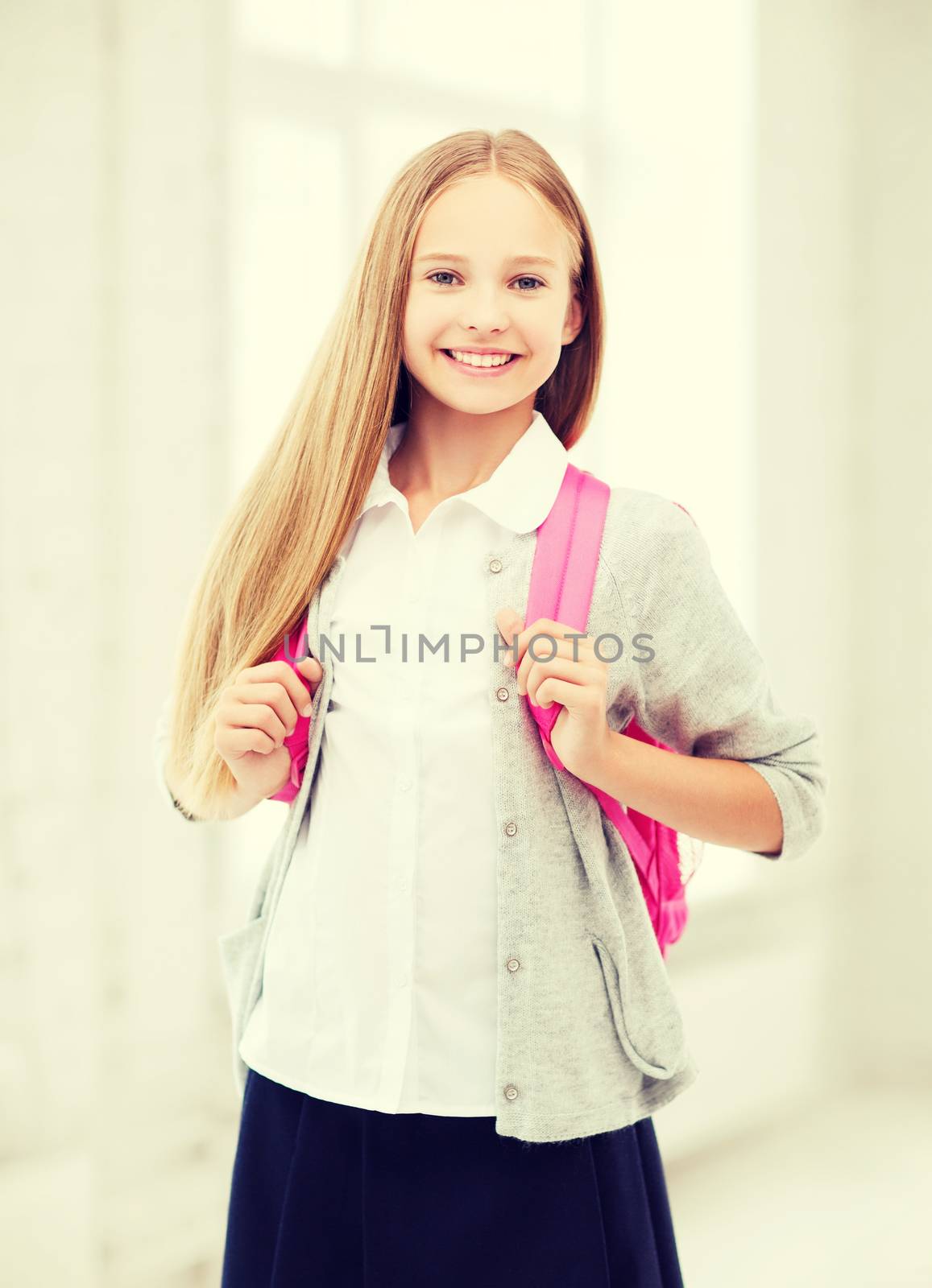 education and school concept - happy and smiling teenage girl with school bag