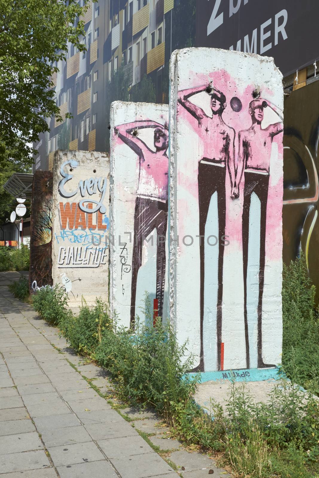 BERLIN, GERMANY - JULY 07: Segments of Berlin Wall in East Berlin filled with grafitti art. July 07, 2015 in Berlin.