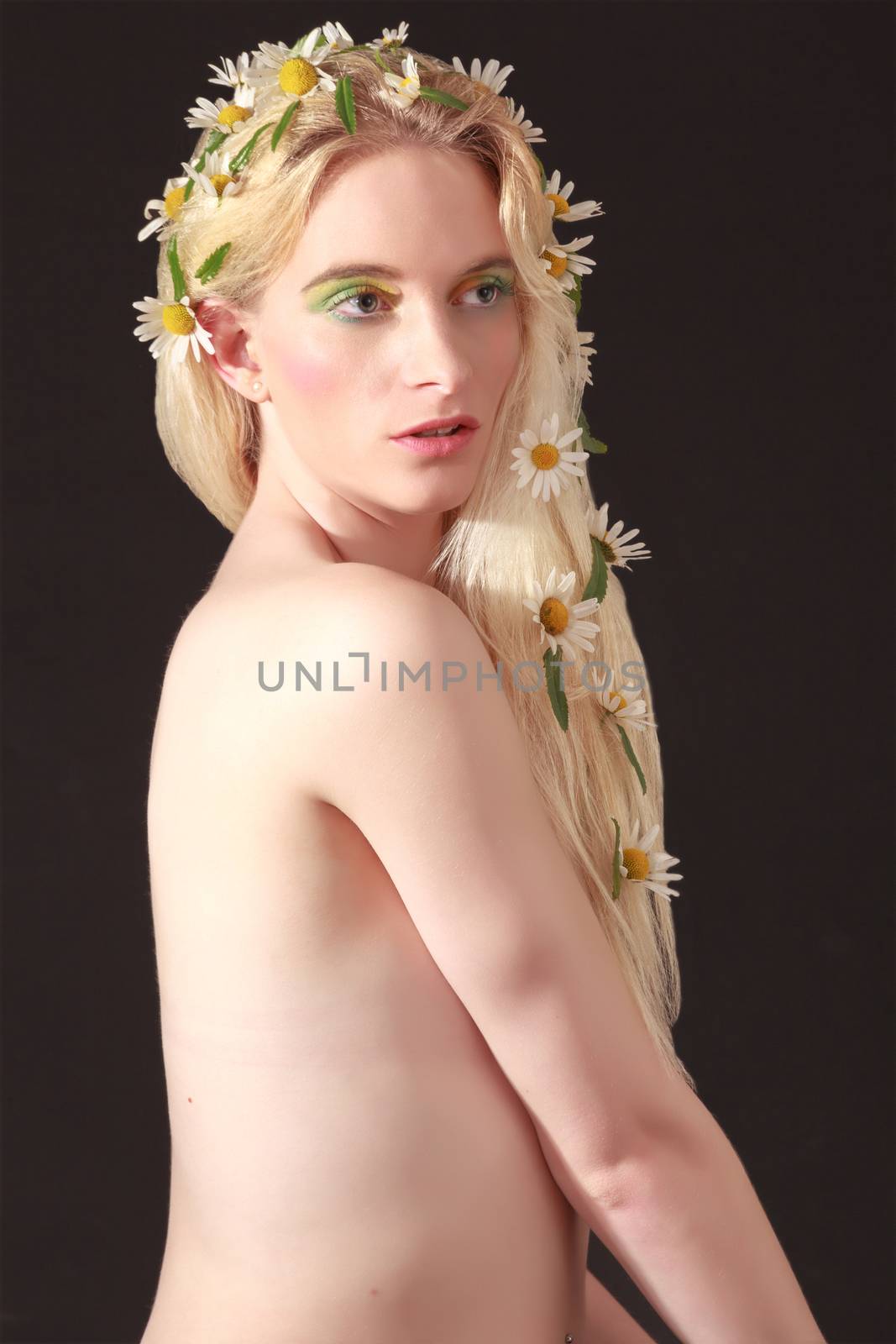 Naked Pretty Woman with Flowers on her Blond Hair by STphotography