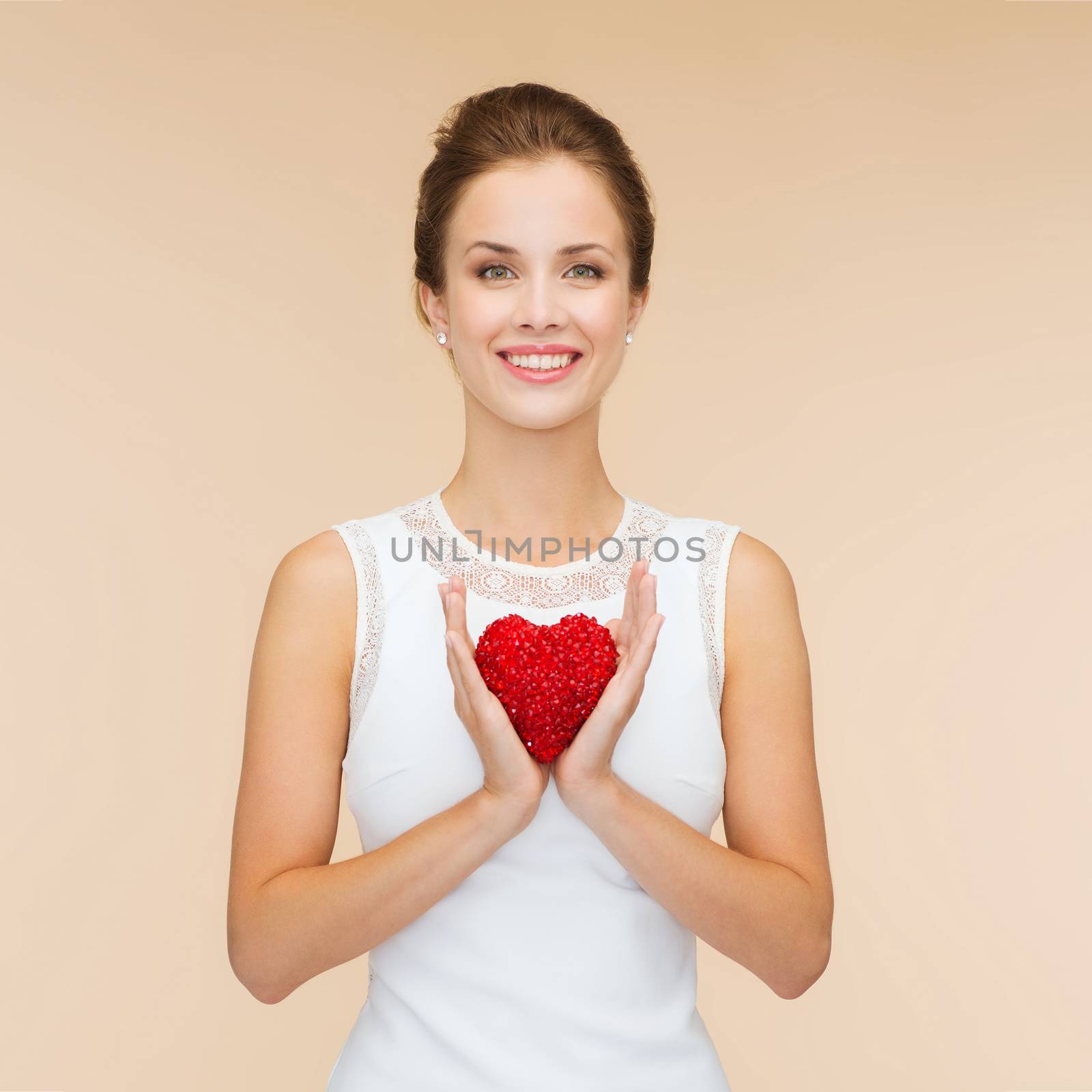 smiling woman in white dress with red heart by dolgachov