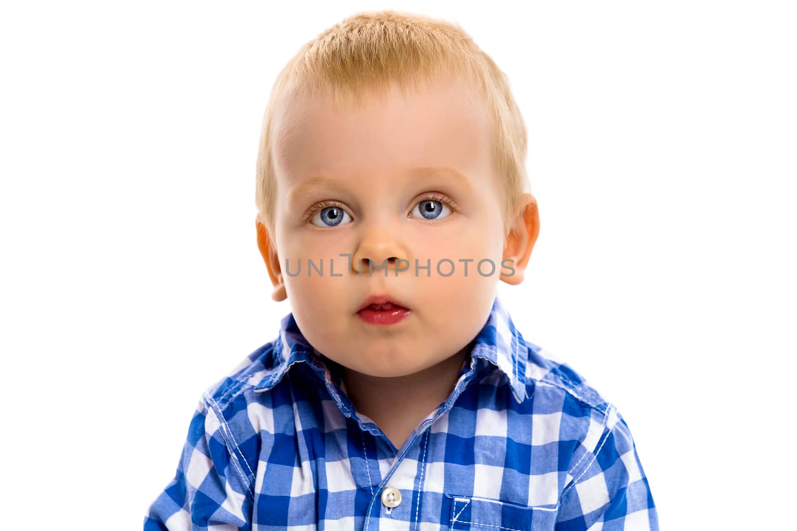blue-eyed baby boy in a plaid shirt