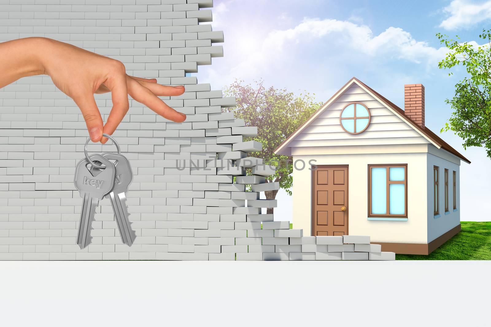 House in broken wall with hand holding keys and green grass and trees