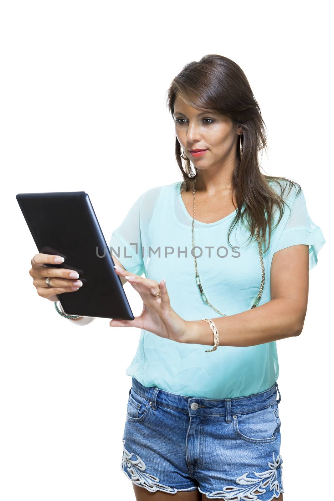 Close up Pretty Young Woman Browsing at her Black Tablet Computer, Isolated on White Background.