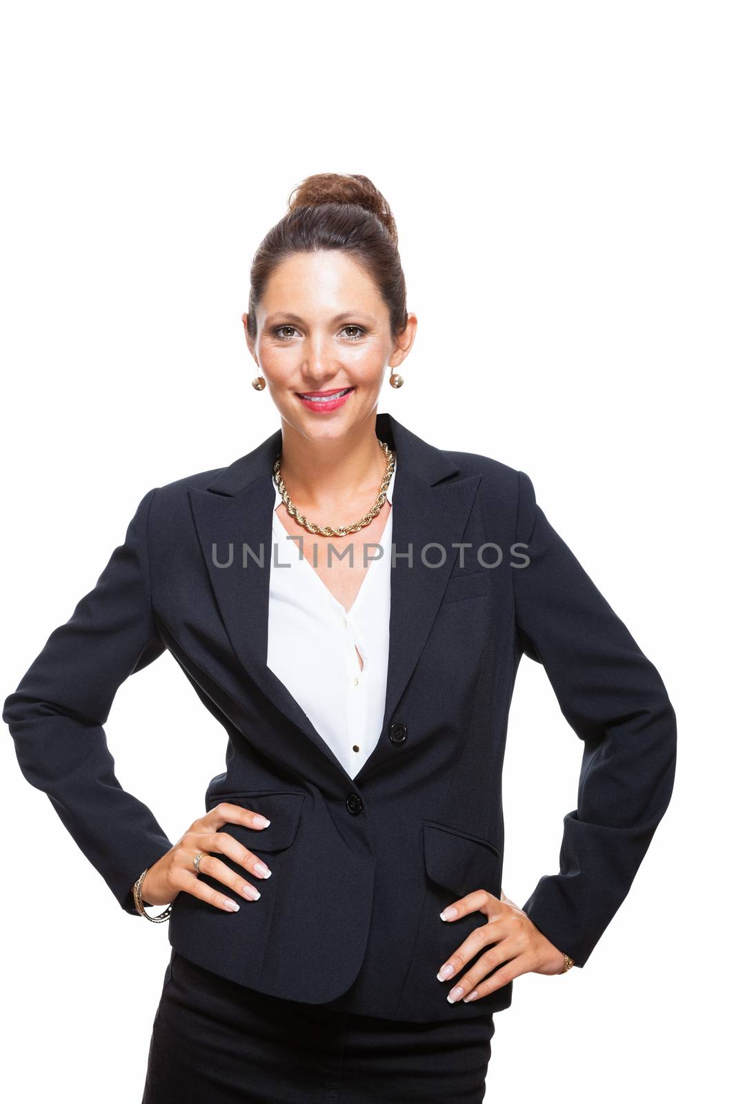 Portrait of a Confident Young Businesswoman in Black Suit, Smiling at the Camera with Arms Crossing Over her Stomach, Isolated on White Background