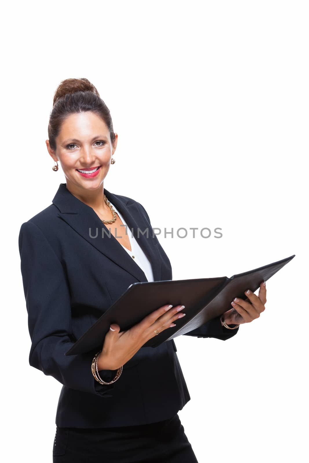 Portrait of an Attractive Young Businesswoman in Black Suit, Holding a File Folder and Smiling at the Camera. Isolated on White Background.