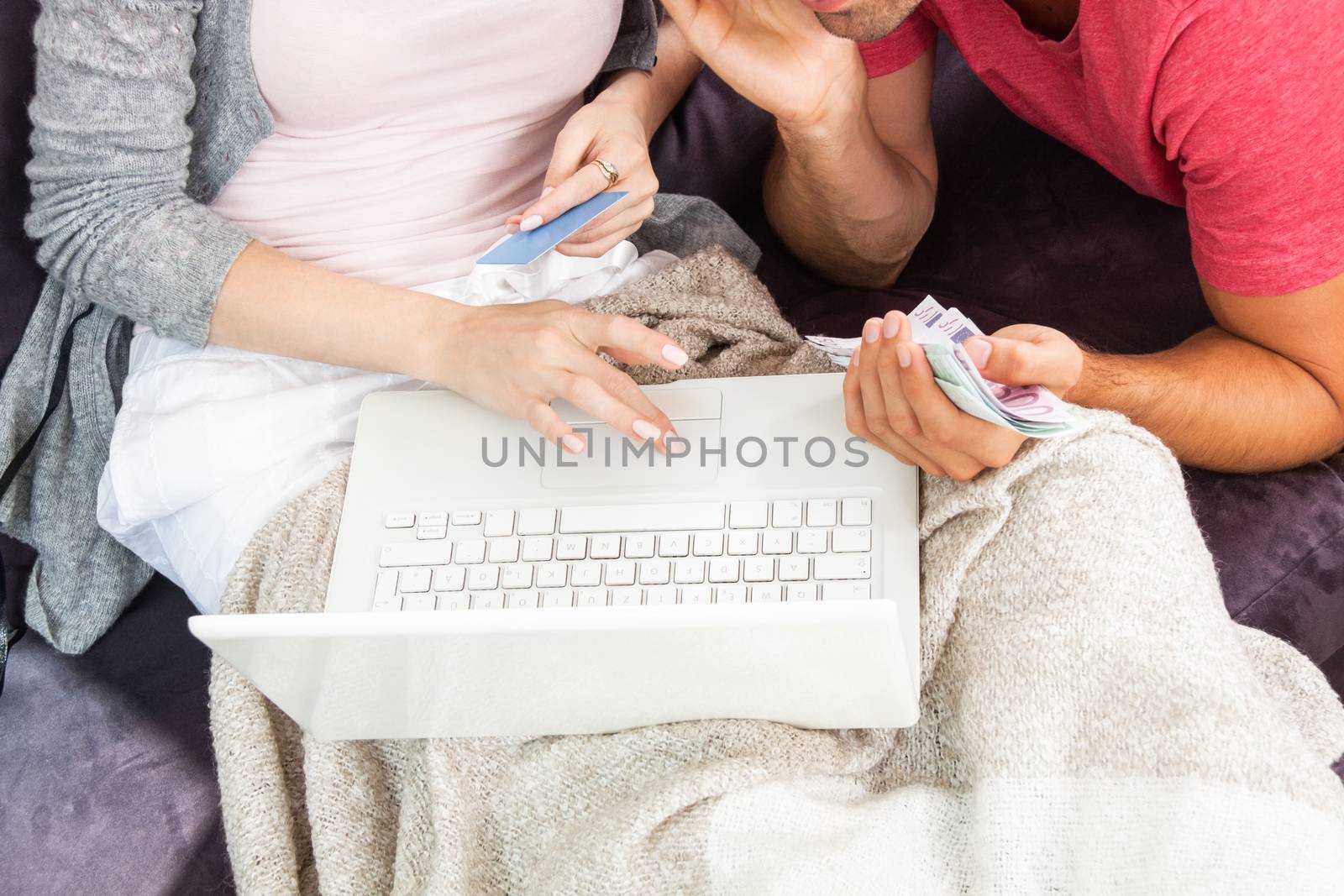 Young Couple Watching a Movie on Laptop Together by juniart