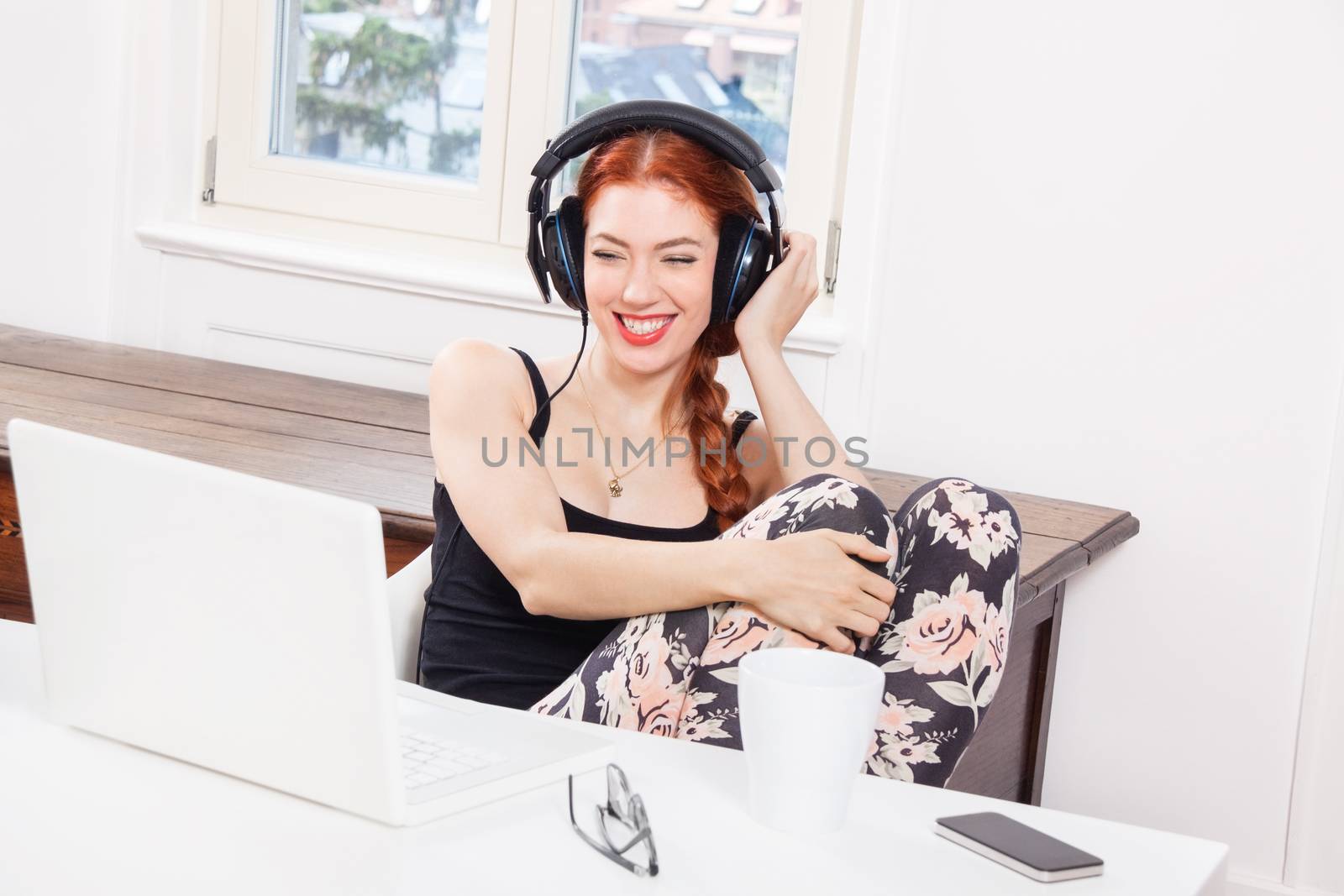 Happy Young Woman Listening Music In her Room by juniart