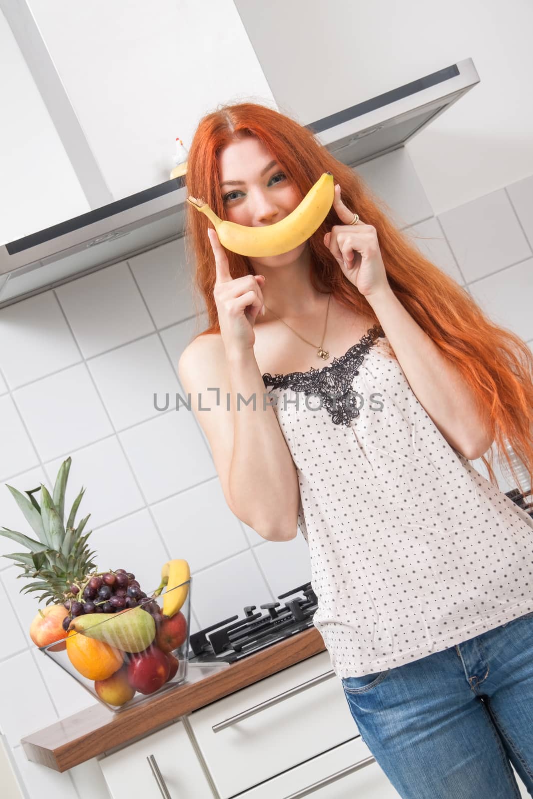 Happy Woman Holding Banana Dancing in the Kitchen by juniart