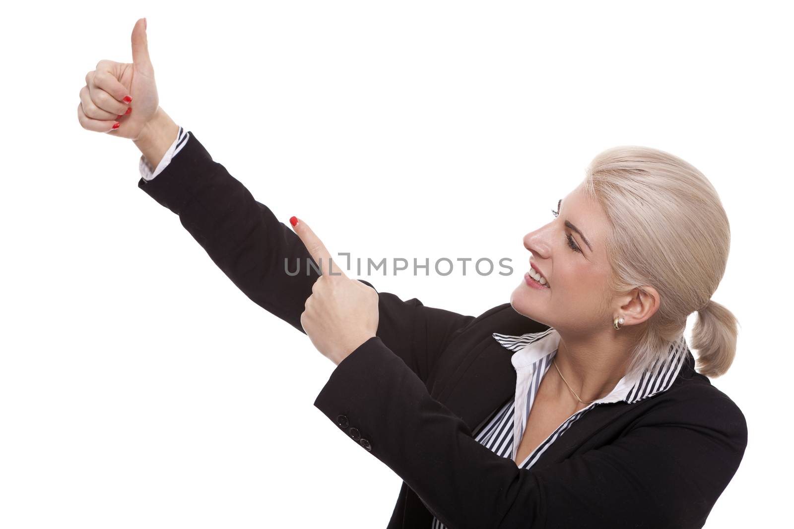 Close up Pretty Smiling Young Businesswoman Pointing Up with her Two Hands While Looking at the Camera. Isolated on White Background.