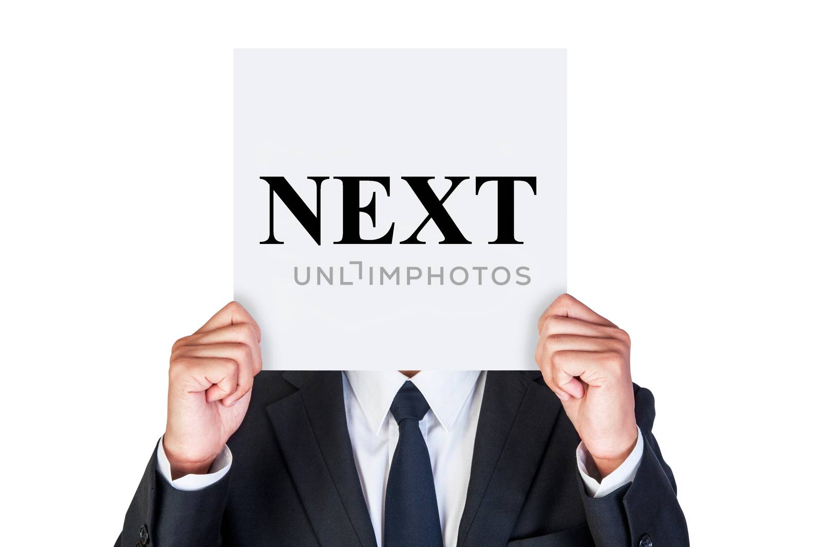 Next concept shown by business man isolated on white background