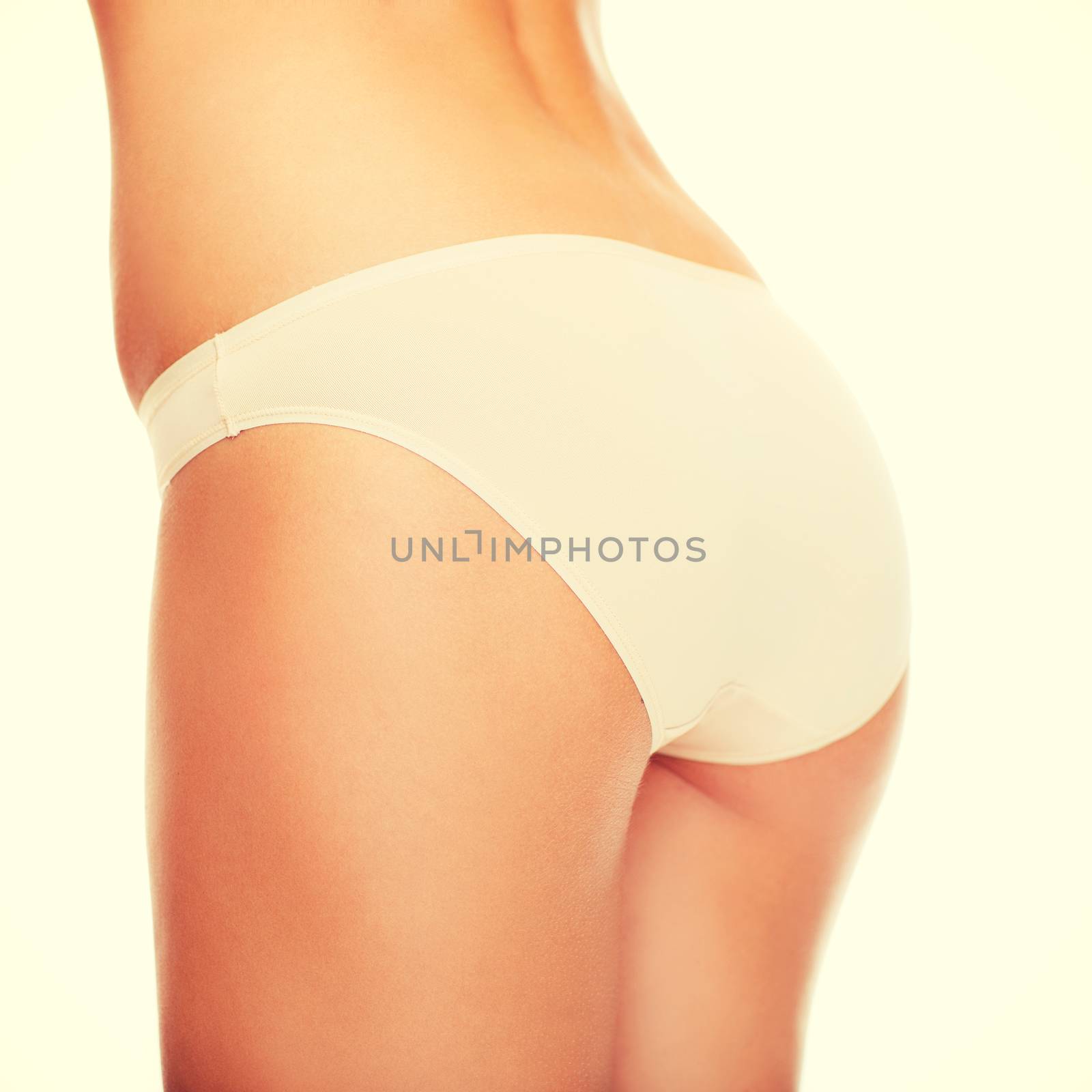 health and beauty - woman in cotton underwear showing slimming concept