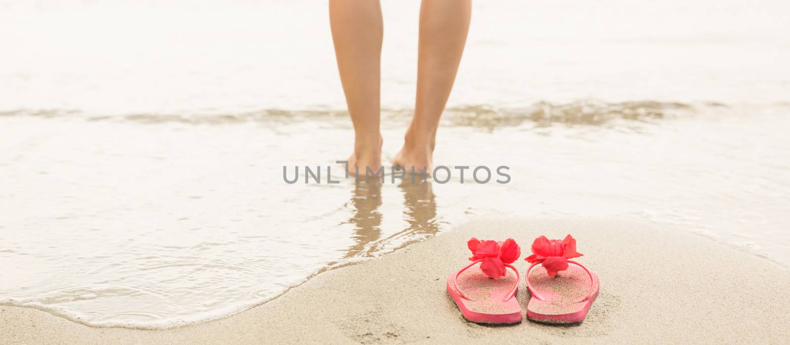 Woman paddling in the sea by Wavebreakmedia