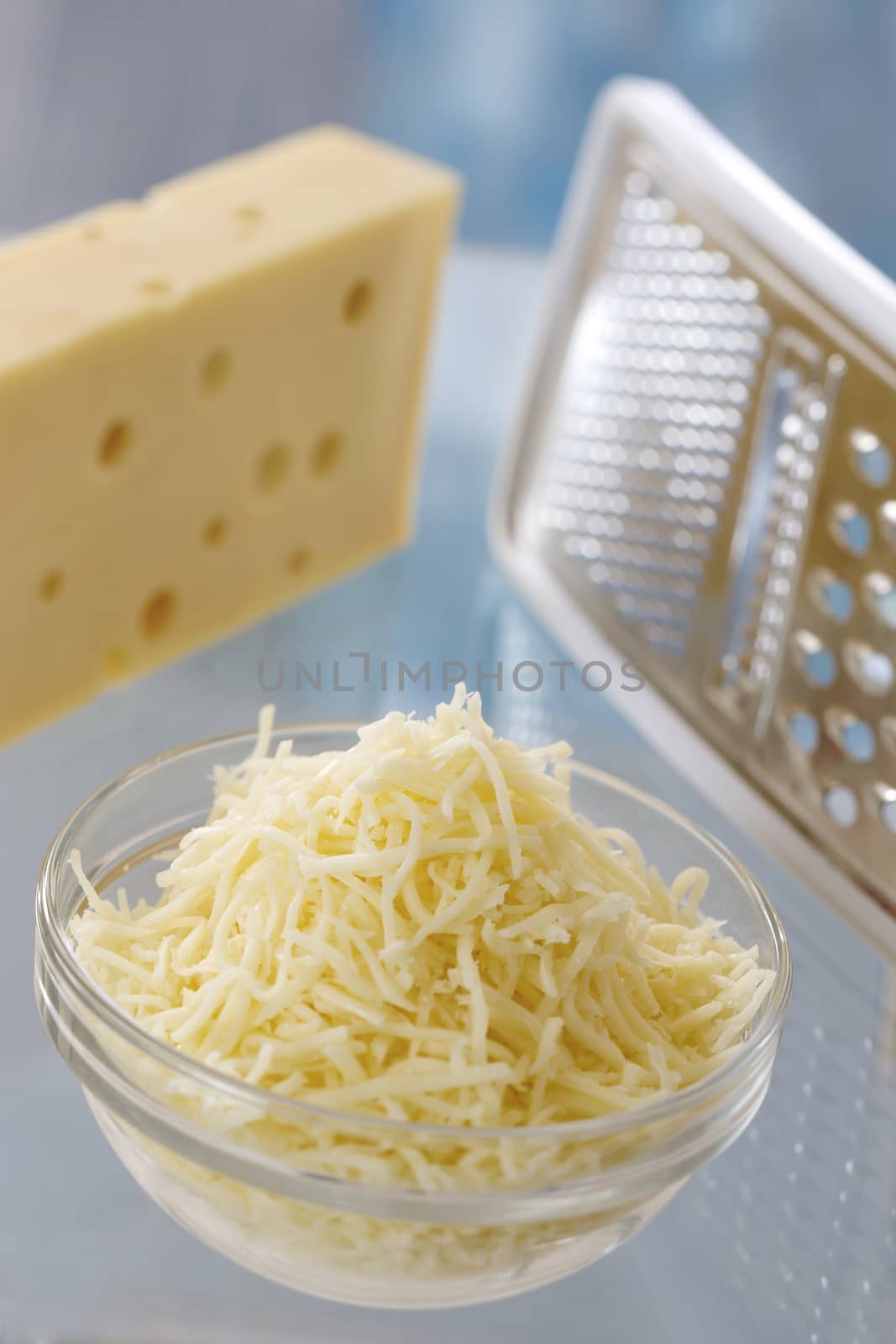 piece of cheese and grated cheese