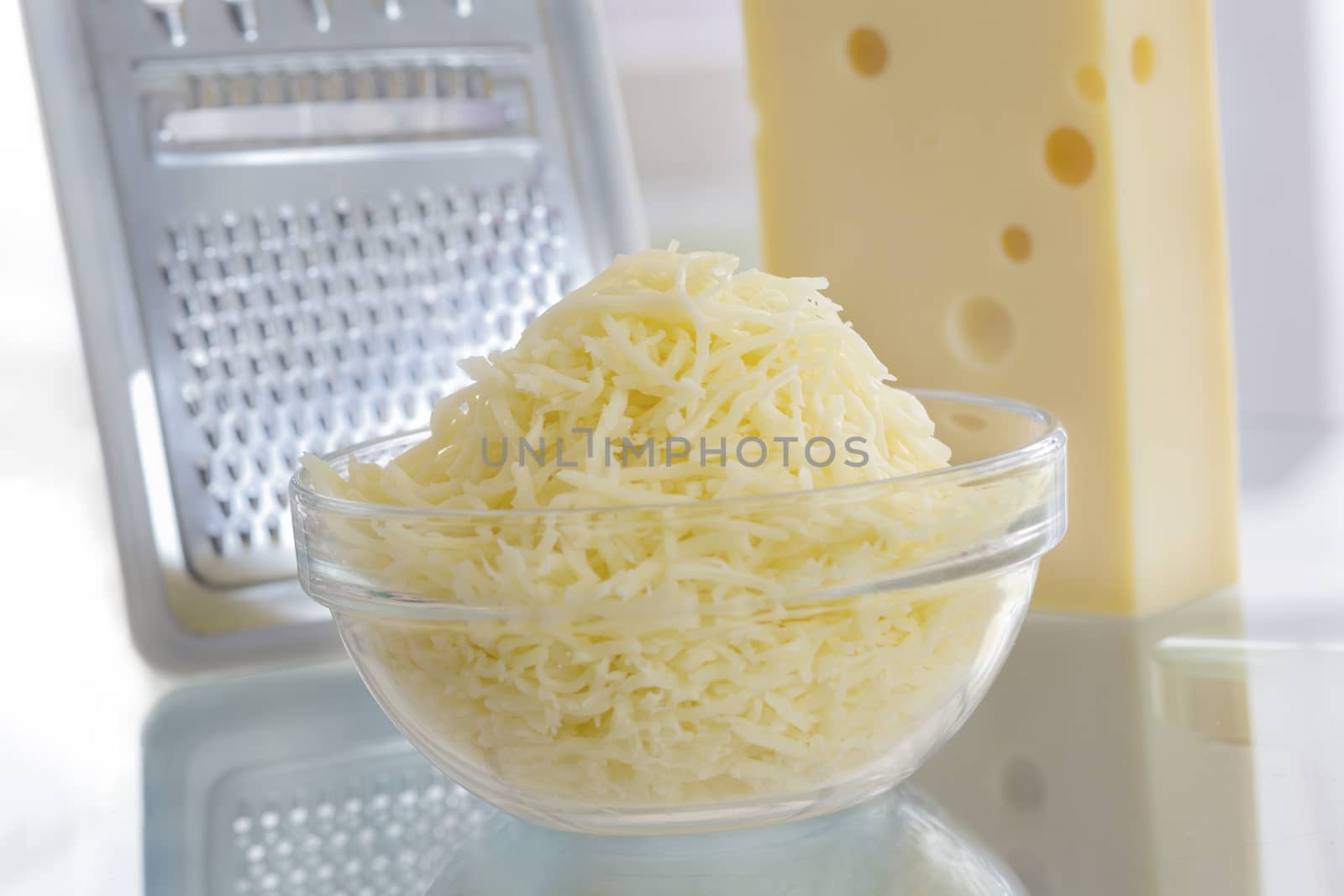 piece of cheese and grated cheese