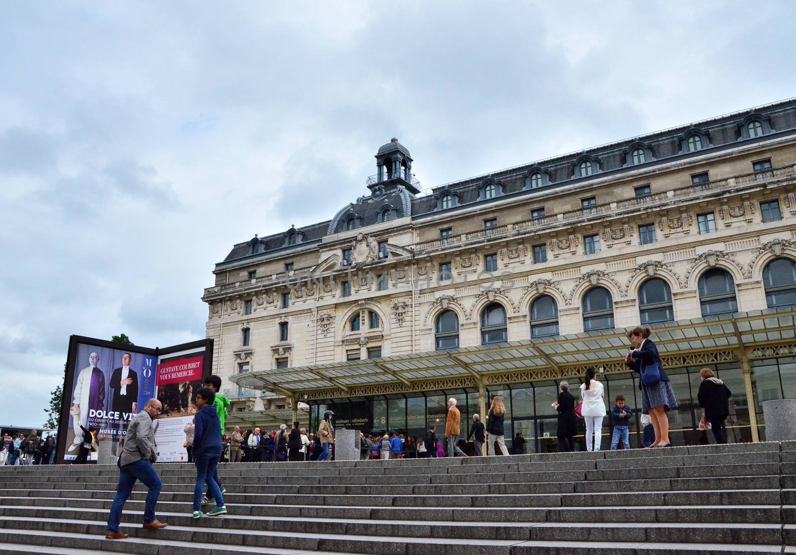 Paris, France - May 14, 2015: Visitors at the Main entrance to the Orsay modern art Museum in Paris, France.The museum houses the largest collection of impressionist and post-impressionist masterpieces in the world