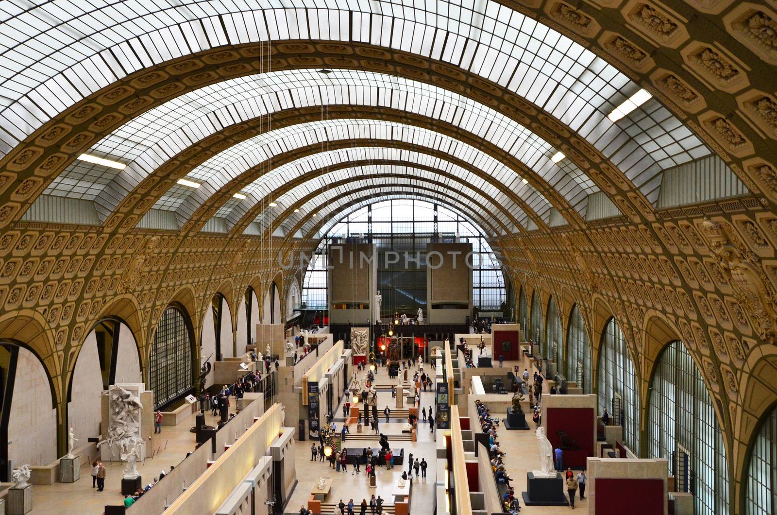 Paris, France - May 14, 2015: Visitors in the Musee d'Orsay in Paris by siraanamwong