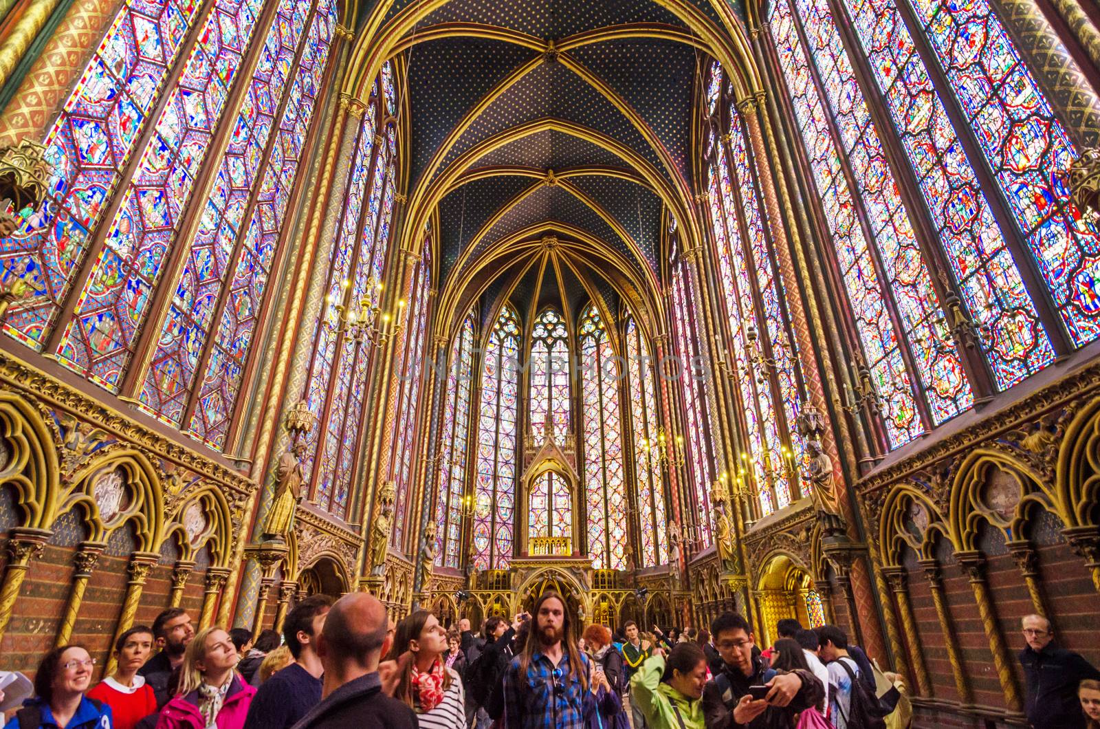 Paris, France - May 14, 2015: Tourists visit Sainte Chapelle in Paris by siraanamwong