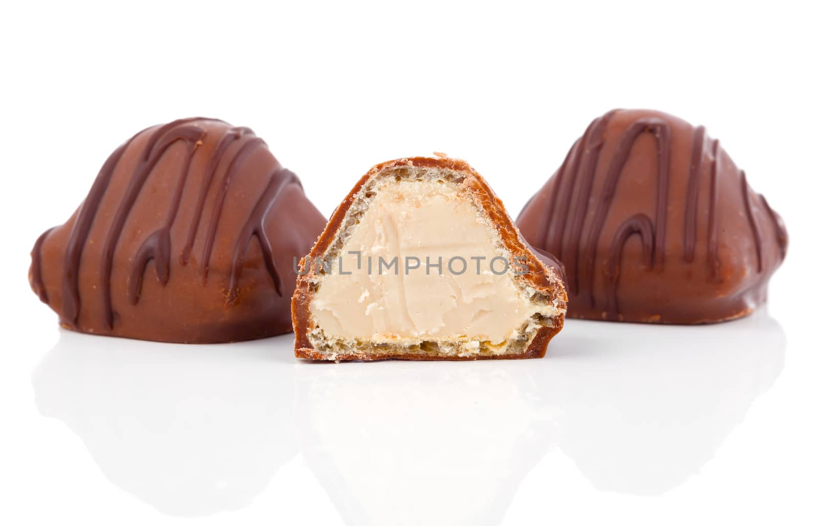 Studio macro of delicious chocolates on a white background