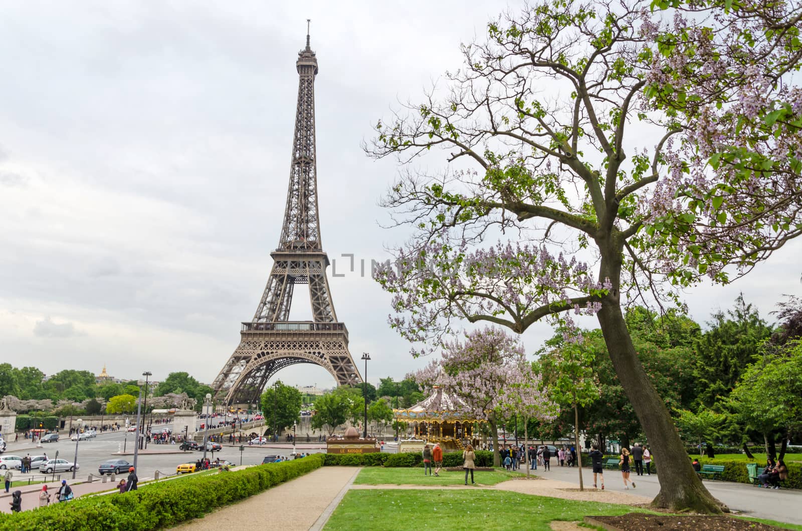 Paris, France - May 15, 2015: Tourist visit Eiffel Tower View from Esplanade du Trocadero on May 15, 2015. This spot at the Esplanade du Trocadero has the best view of the iconic landmark and attracts huge crowds daily.