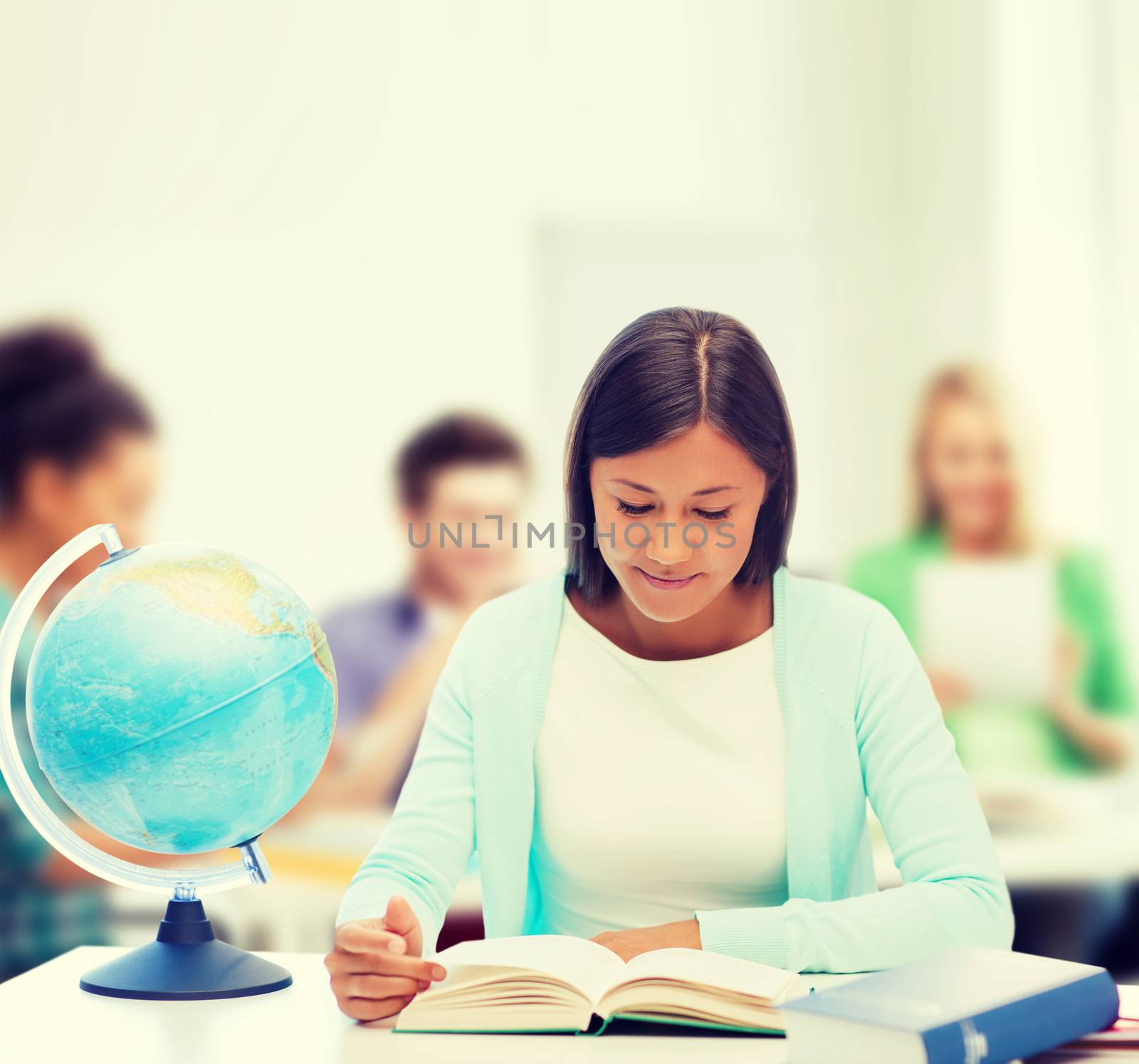 education and school, travel concept - female teacher with globe and book