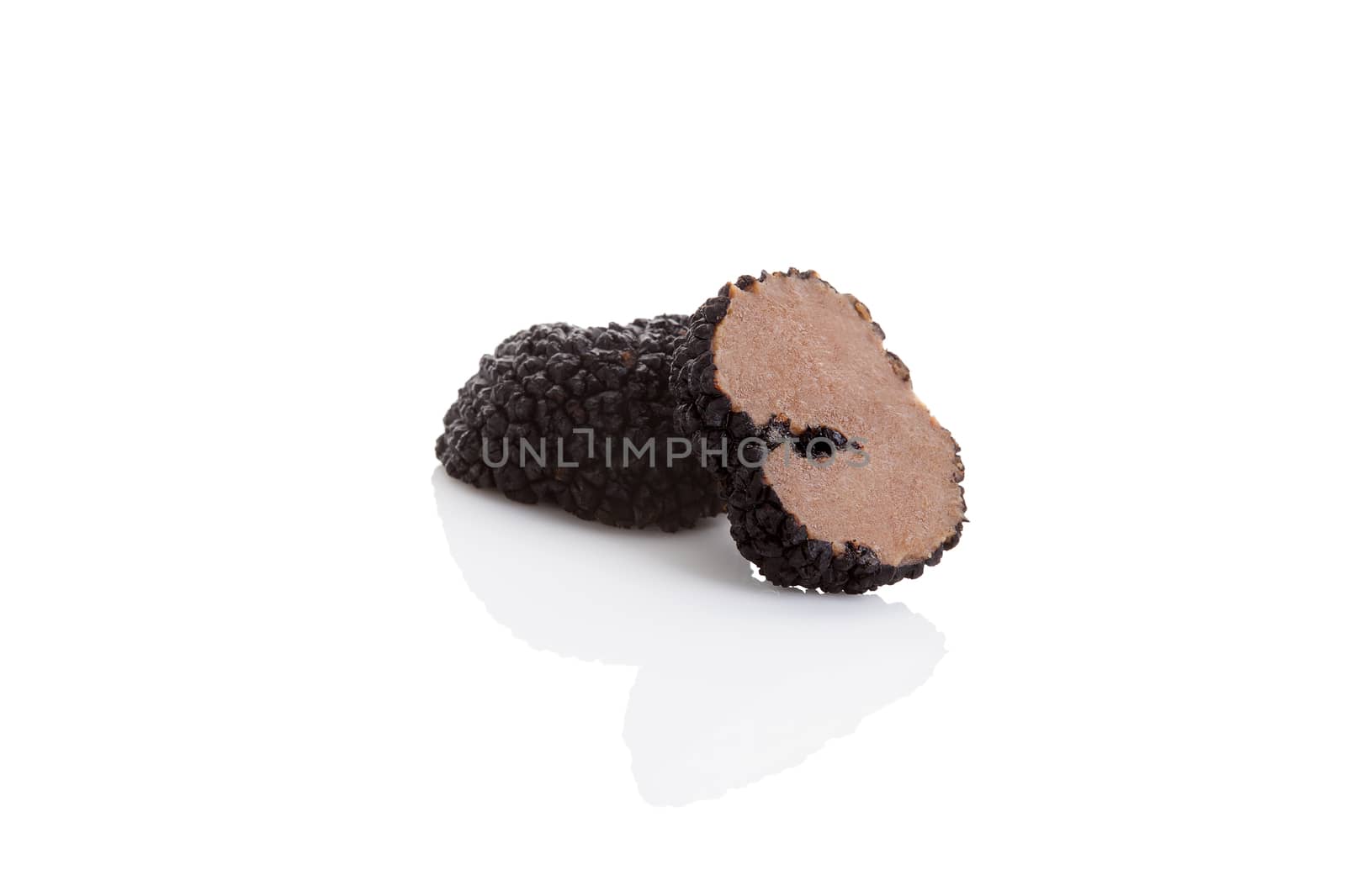 Cut truffles isolated on white background. Luxurious culinary cooking ingredienets. 